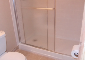 Modular shower unit added to a basement bathroom remodel