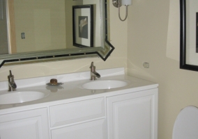 New vanity, mirror and the old tile removed